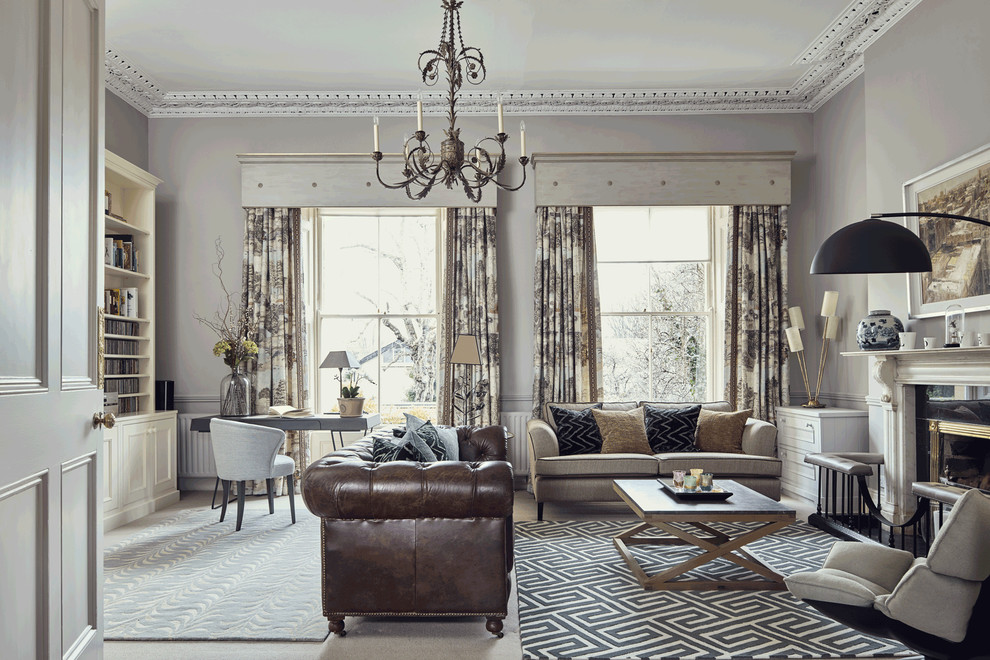 Inspiration for a traditional formal and grey and brown enclosed living room in Dublin with grey walls, carpet, a standard fireplace, a stone fireplace surround, no tv and beige floors.