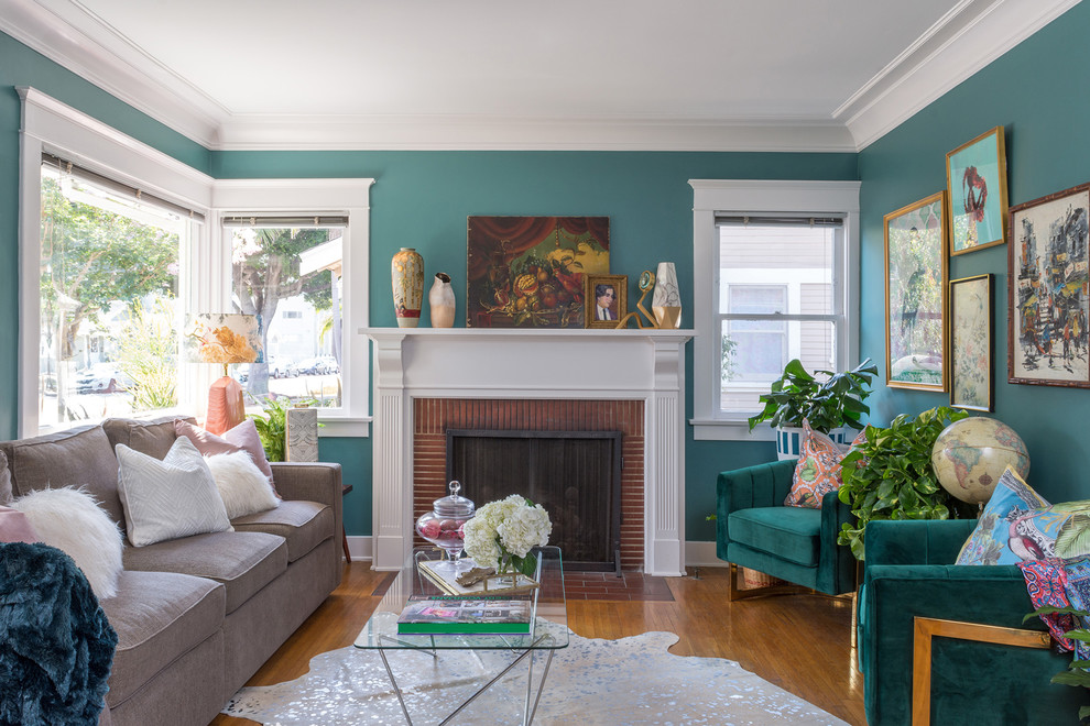 Immagine di un soggiorno eclettico con pareti verdi