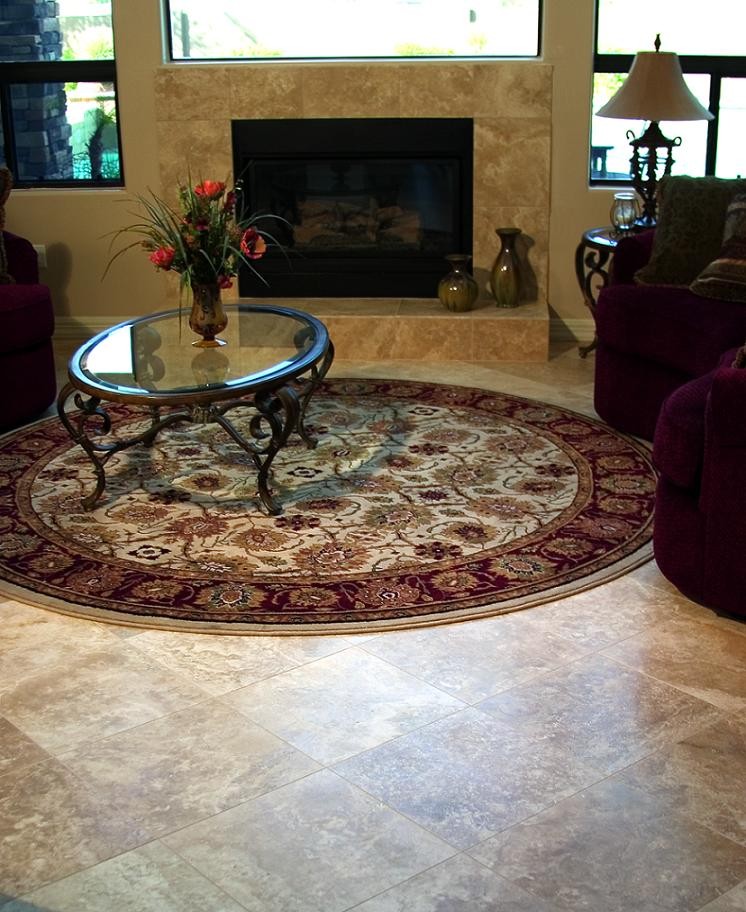 This is an example of a medium sized classic open plan living room in Phoenix with beige walls, travertine flooring, a standard fireplace and a tiled fireplace surround.
