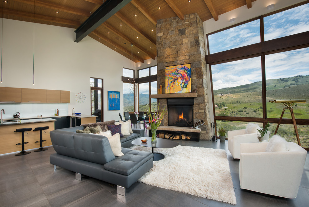 Living room - huge contemporary open concept porcelain tile and gray floor living room idea in Denver with white walls, a standard fireplace and a stone fireplace