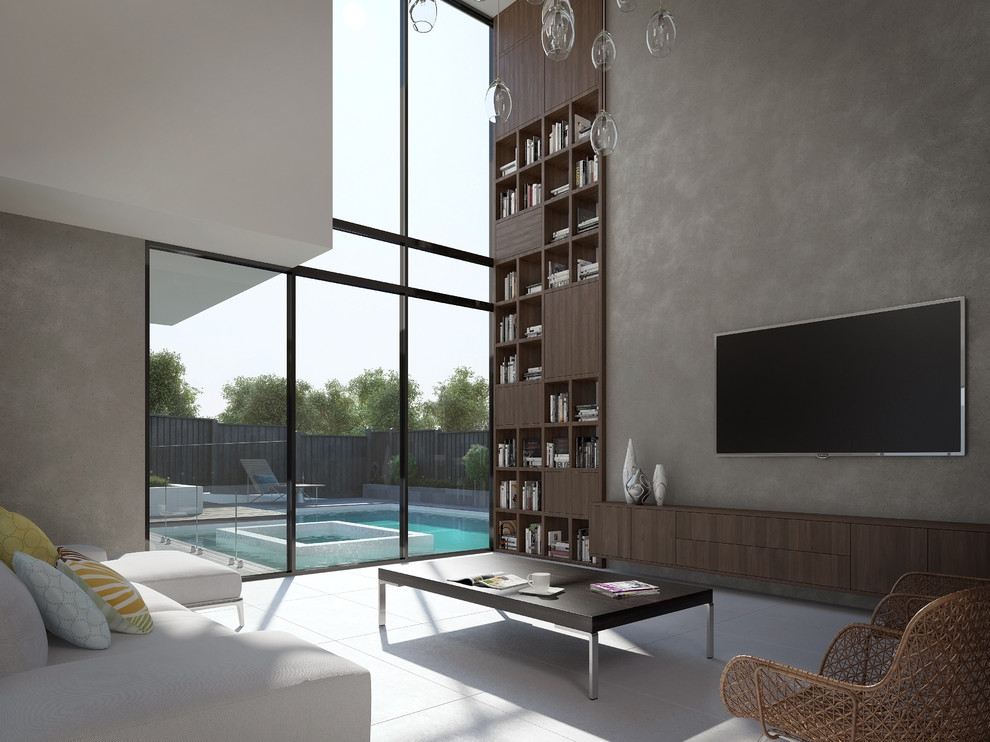 Réalisation d'un très grand salon minimaliste ouvert avec un mur gris et un téléviseur fixé au mur.