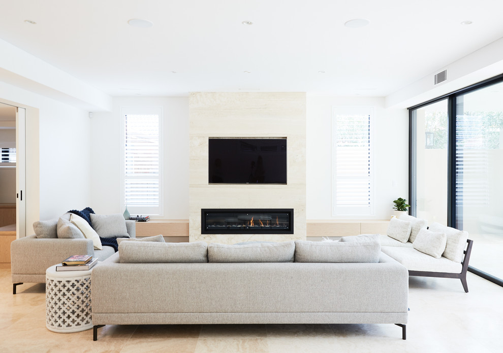 Inspiration for a contemporary living room in Sydney with white walls, a ribbon fireplace and a wall mounted tv.