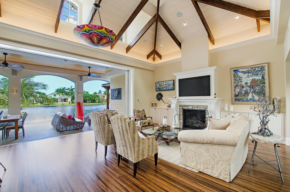 Example of an island style living room design in Miami