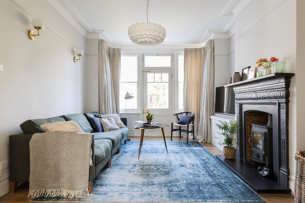 Photo of a classic open plan living room in London.