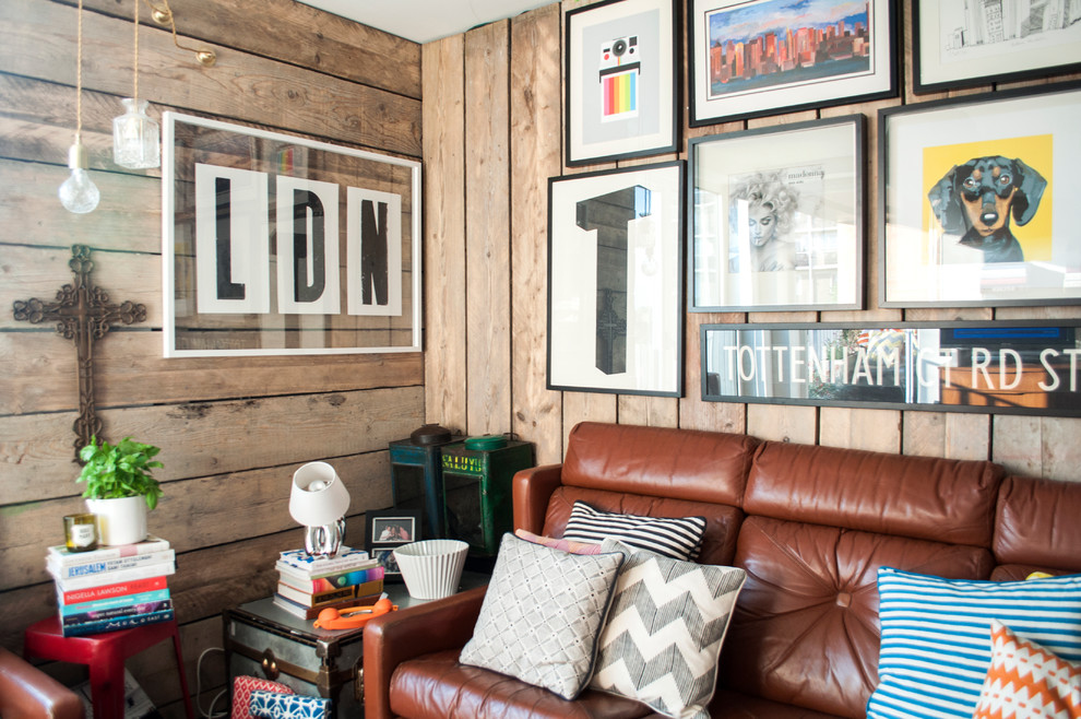 Inspiration for a medium sized eclectic formal open plan living room in London with white walls and a freestanding tv.