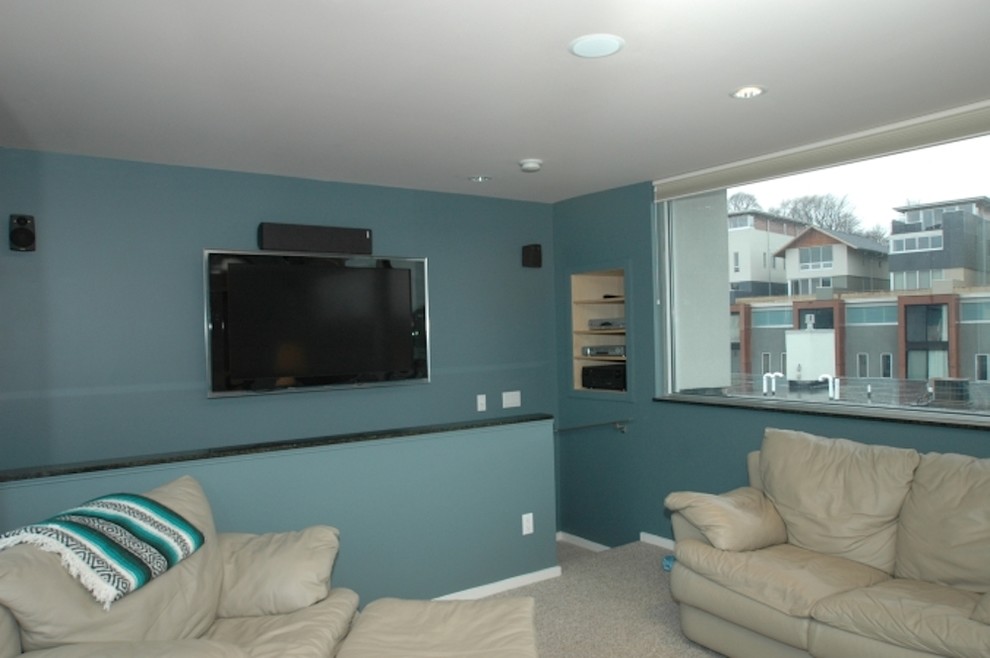 This is an example of a medium sized contemporary formal enclosed living room in Milwaukee with no tv.