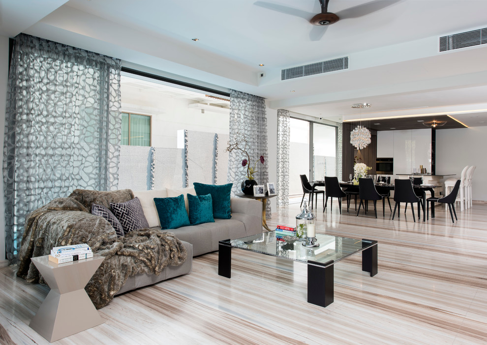 Стильный дизайн: открытая гостиная комната в современном стиле с белыми стенами - последний тренд