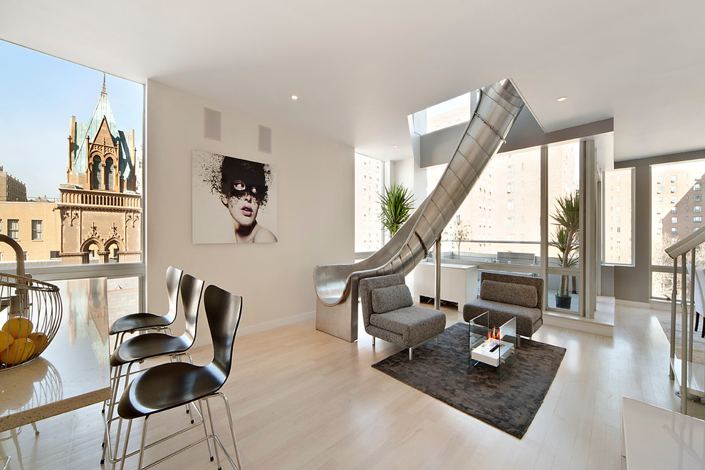Living room - contemporary light wood floor living room idea in New York