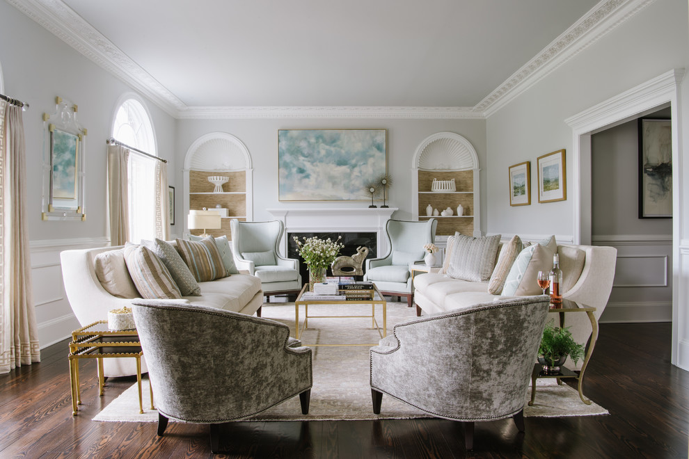 Inspiration for a traditional formal enclosed living room in DC Metro with grey walls, dark hardwood flooring, a standard fireplace, a stone fireplace surround and no tv.