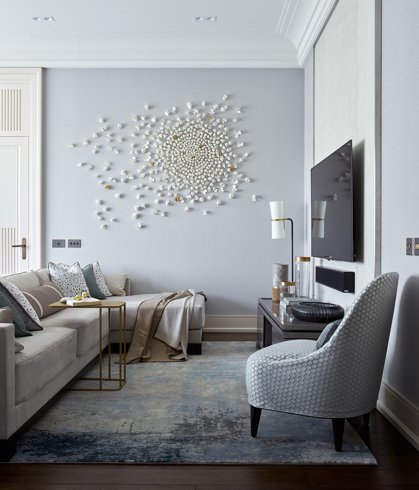 Example of a transitional dark wood floor and brown floor living room design in London with gray walls, no fireplace and a wall-mounted tv