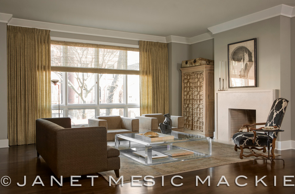 This is an example of a contemporary formal open plan living room in Chicago with grey walls, dark hardwood flooring, a standard fireplace and a stone fireplace surround.