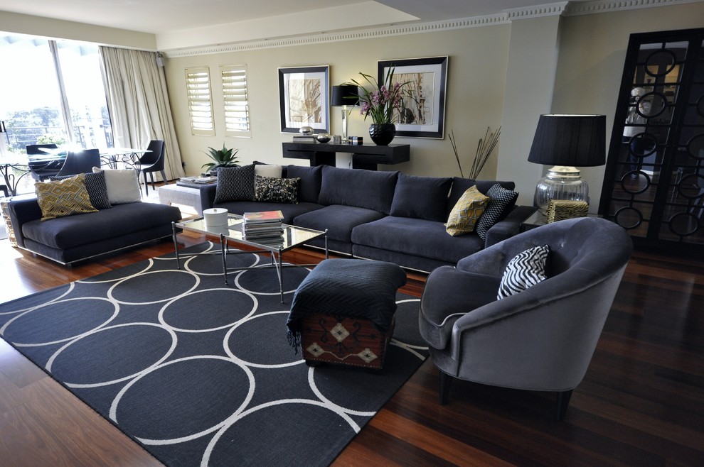 Design ideas for a medium sized modern open plan living room in Brisbane with dark hardwood flooring and no fireplace.
