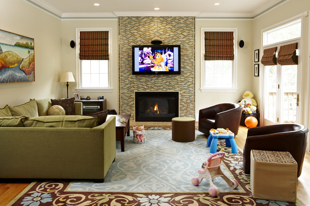 Design ideas for a bohemian living room in DC Metro with a tiled fireplace surround.