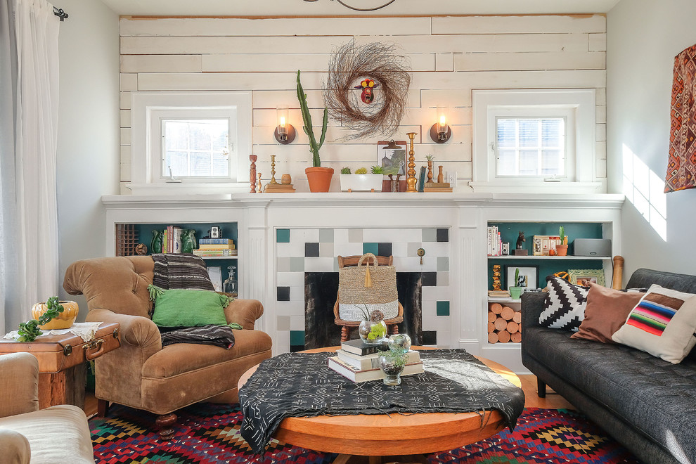 Eclectic light wood floor living room photo in Portland with white walls, a standard fireplace and a tile fireplace