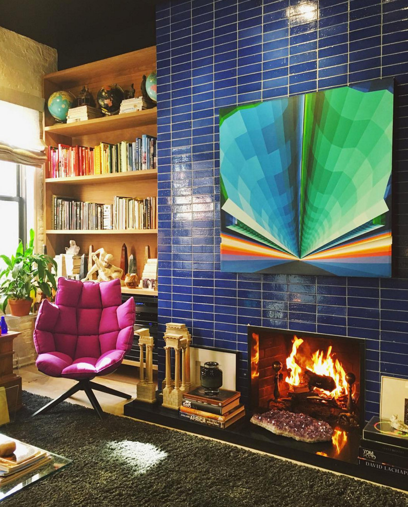 Example of an eclectic living room design in San Francisco with a ribbon fireplace and a brick fireplace