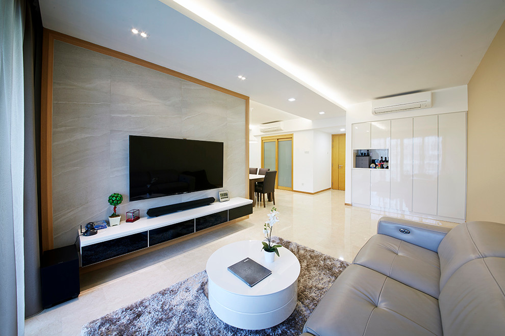 Large modern formal open plan living room in Singapore with beige walls and marble flooring.