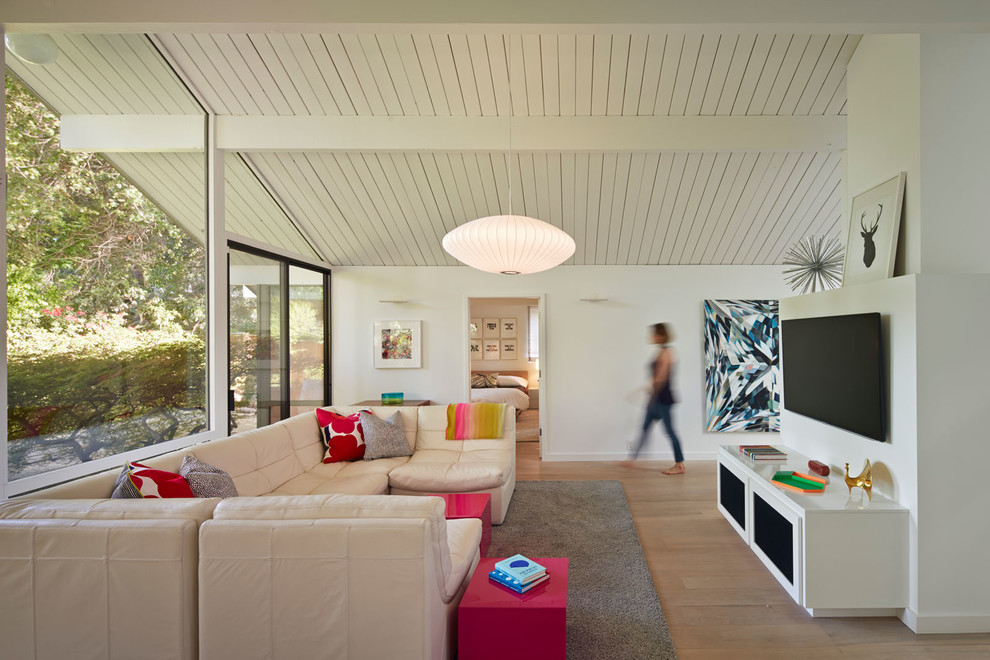 Inspiration for a midcentury living room in San Francisco with white walls.