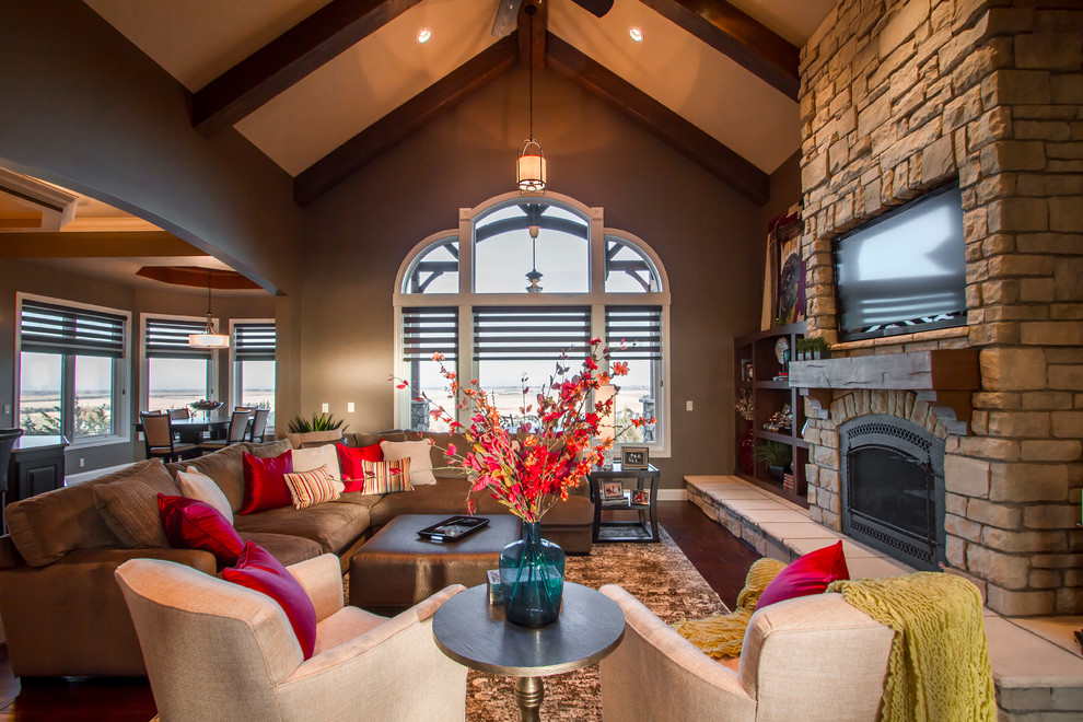 This is an example of a traditional living room in Other with brown walls.