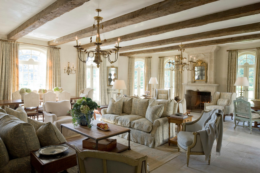 Living room - large french country formal and open concept slate floor living room idea in Houston with beige walls, a standard fireplace, a stone fireplace and no tv