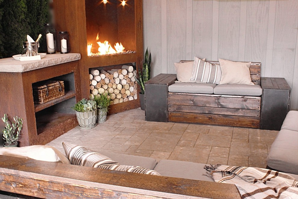 Living room - mid-sized farmhouse formal and open concept medium tone wood floor and brown floor living room idea in Other with beige walls, a corner fireplace, a stone fireplace and no tv