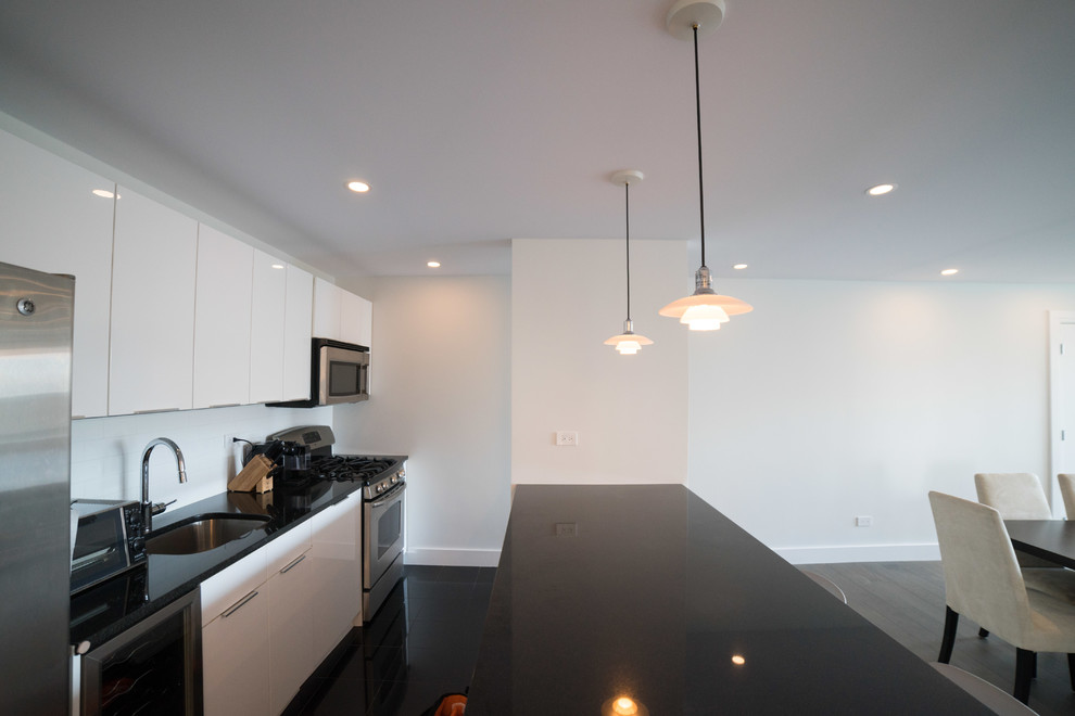 Encapsulation of popcorn ceiling and lighting upgrade in Roosevelt