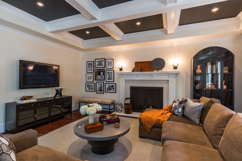 Inspiration for a transitional living room remodel in San Diego with a standard fireplace and a wall-mounted tv