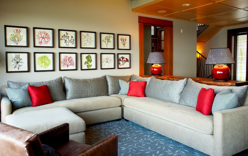 This is an example of a contemporary living room in Seattle with beige walls and feature lighting.
