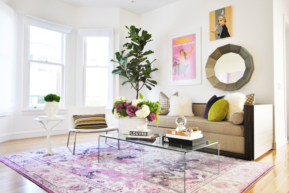 Medium sized contemporary enclosed living room in San Francisco with white walls, medium hardwood flooring and orange floors.