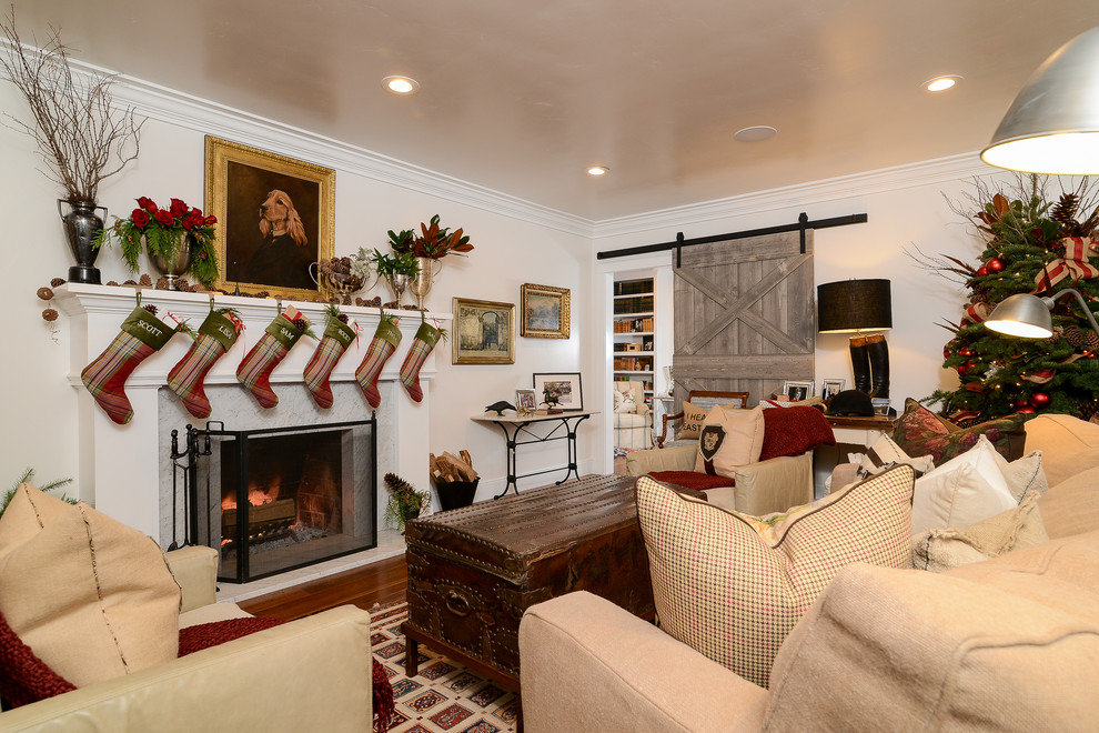 Inspiration for a medium sized rural formal enclosed living room in Sacramento with white walls, dark hardwood flooring, a standard fireplace, a stone fireplace surround and no tv.
