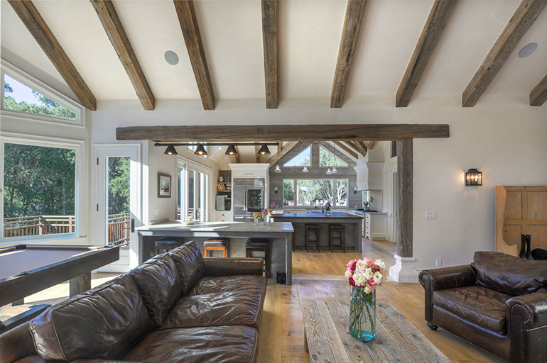 Large farmhouse open plan living room in San Francisco with light hardwood flooring and no fireplace.