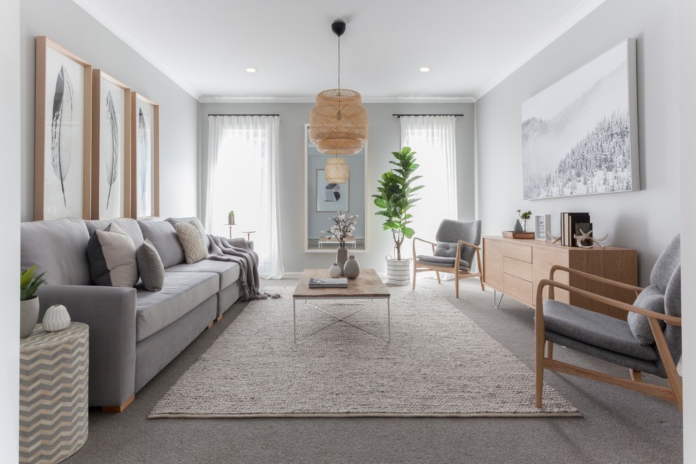 Ispirazione per un soggiorno nordico chiuso con sala formale, pareti grigie, moquette e pavimento grigio