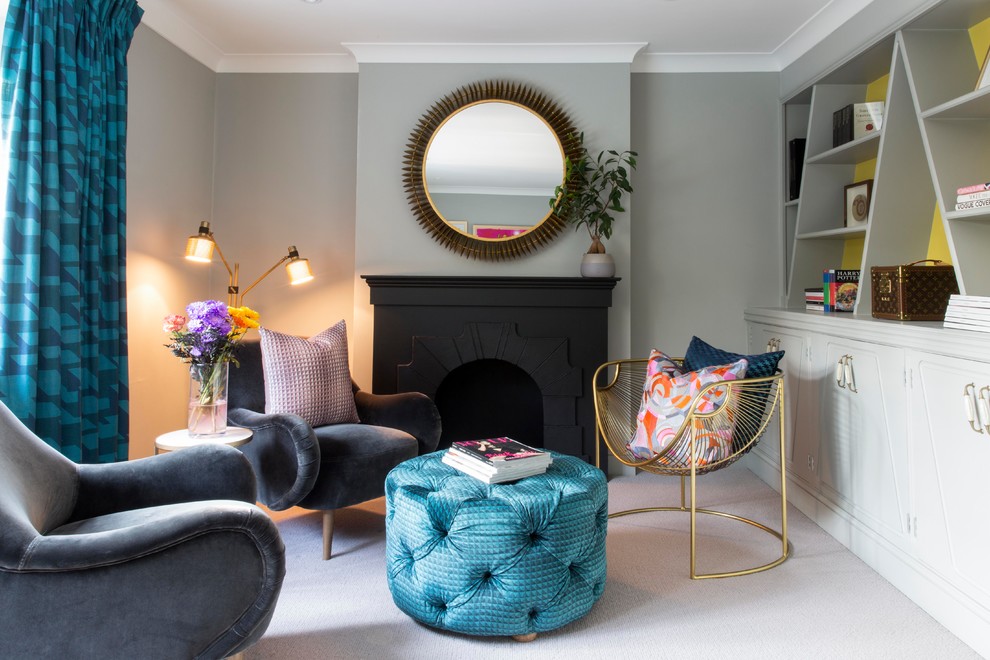 Design ideas for a medium sized classic grey and teal enclosed living room in Essex with a reading nook, grey walls, carpet, a standard fireplace, a plastered fireplace surround and beige floors.
