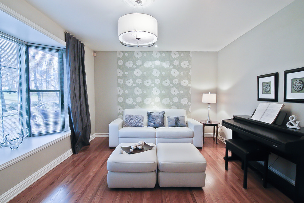 Trendy living room photo in Montreal with a music area and gray walls