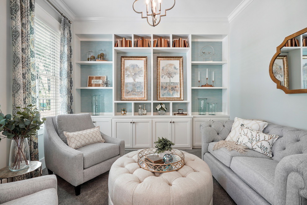 This is an example of a traditional formal enclosed living room in Columbus with white walls, carpet, no fireplace, no tv and grey floors.