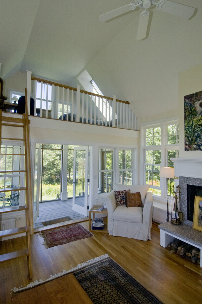 Example of a trendy living room design in Boston with beige walls