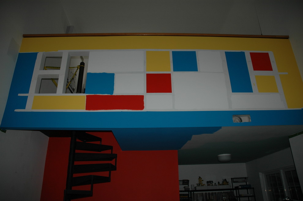 Idee per un piccolo soggiorno design stile loft con pareti multicolore