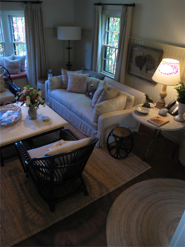 Example of a farmhouse living room design in Boston