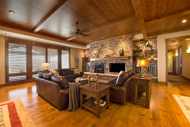 Expansive Living Room with Stacked stone fireplace ...