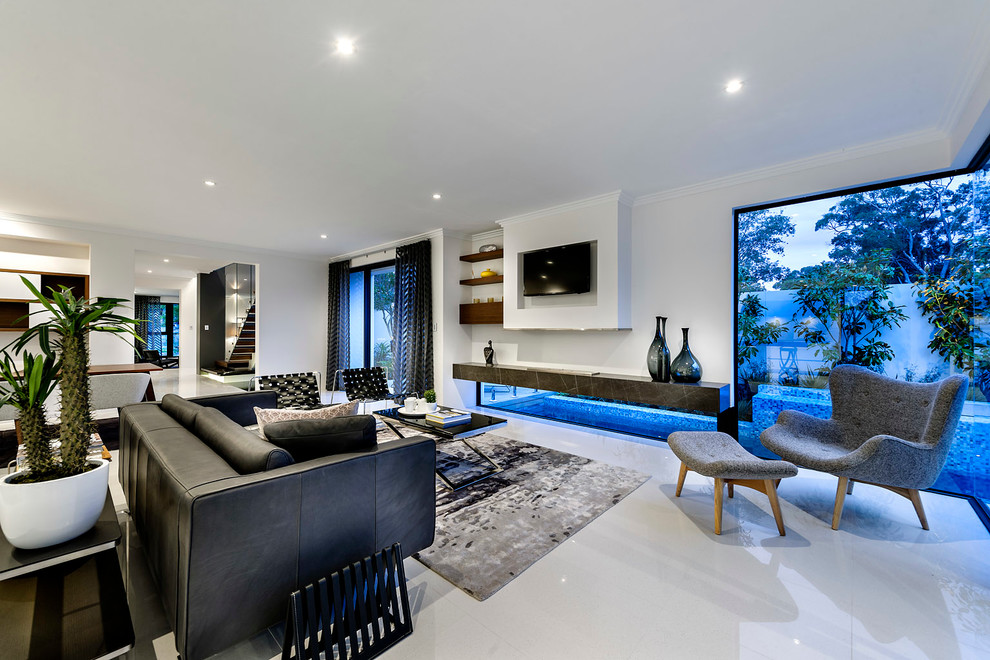 Living room - contemporary open concept ceramic tile living room idea in Perth with a wall-mounted tv