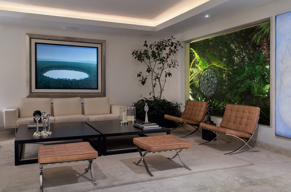 Example of a trendy carpeted living room design in Mexico City with white walls