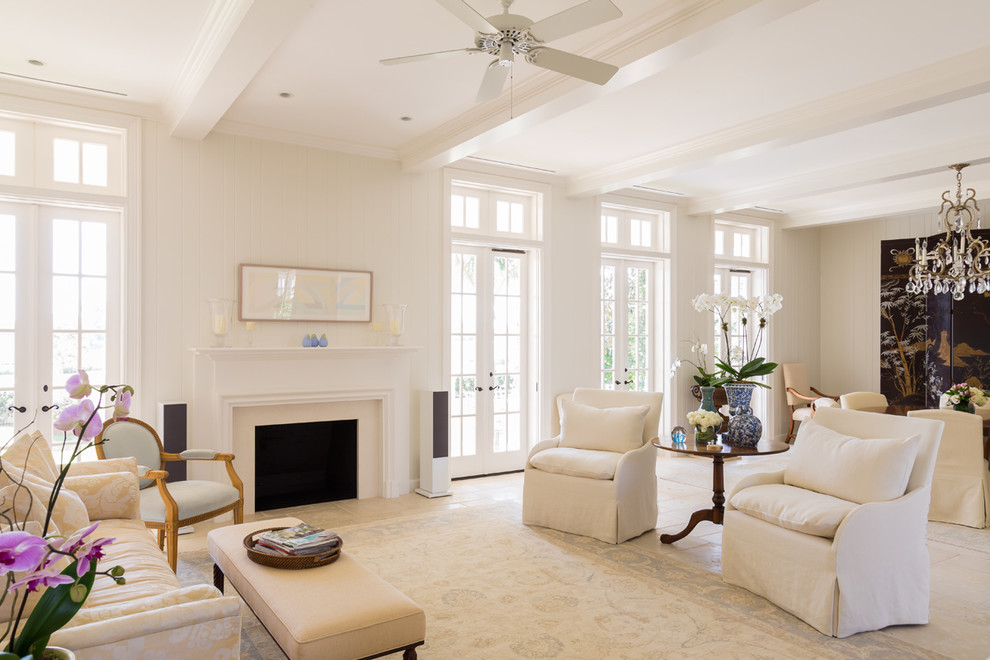 Photo of a large contemporary open plan living room in Miami with white walls and medium hardwood flooring.