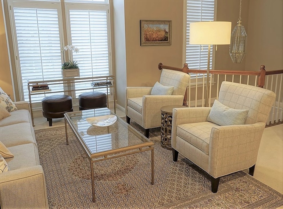Example of a small trendy open concept carpeted living room design in DC Metro with beige walls and no tv