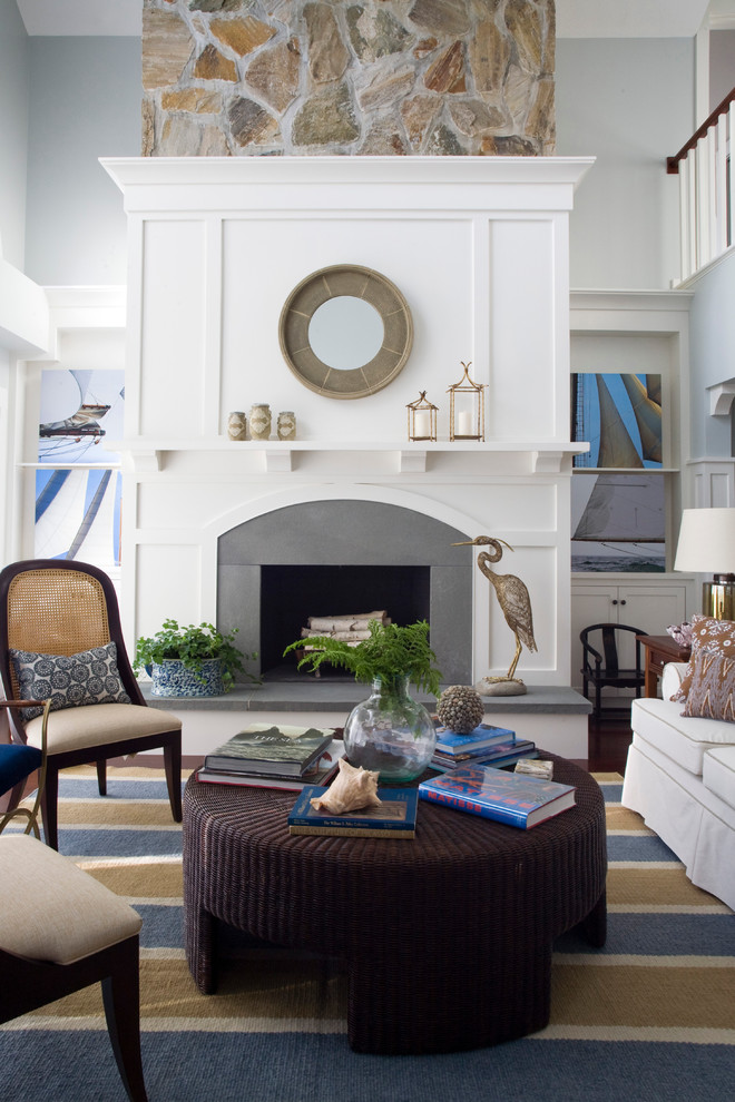 Inspiration for a beach style living room in Providence with grey walls.