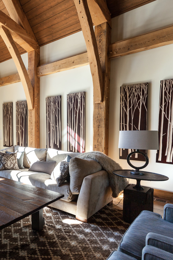 Inspiration for a rustic living room in Sacramento with white walls.