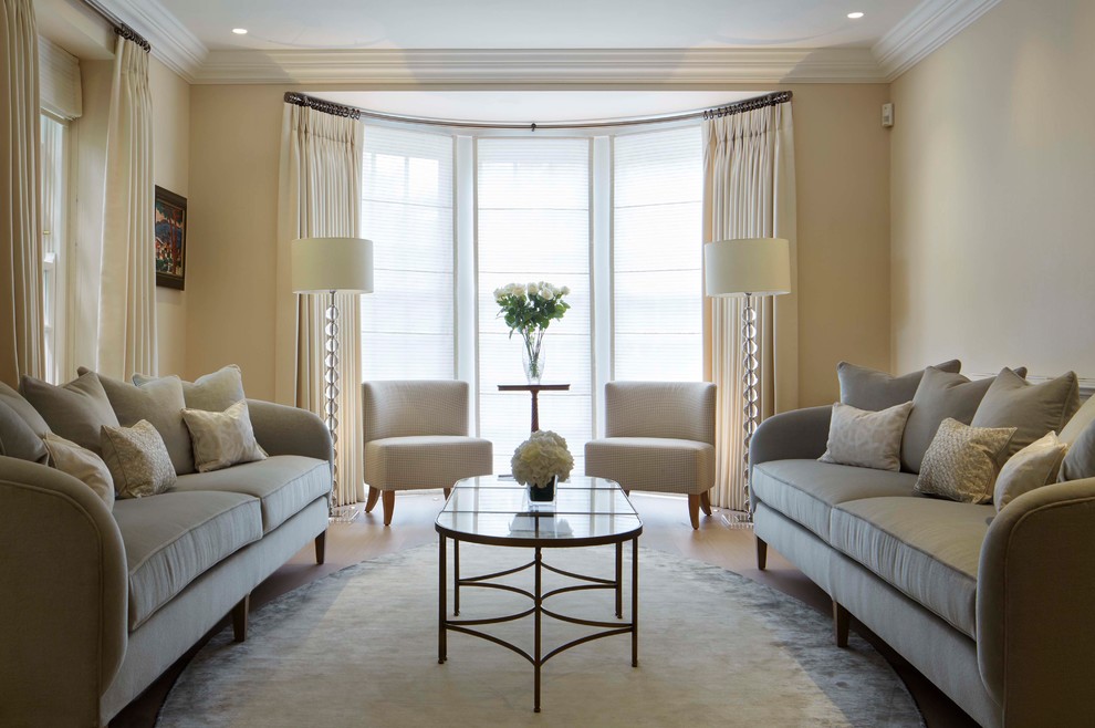 Living room - mid-sized transitional formal gray floor living room idea in Sussex with no tv and beige walls