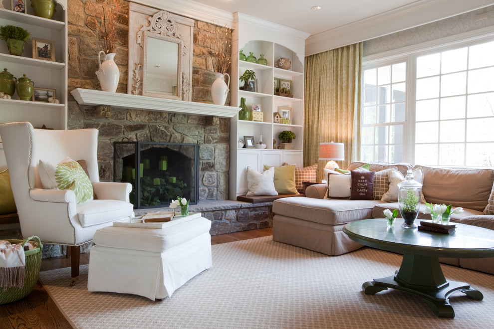 This is an example of a medium sized traditional formal enclosed living room in Baltimore with a standard fireplace, a stone fireplace surround, dark hardwood flooring, no tv, brown floors and feature lighting.