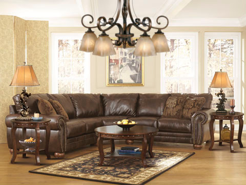 Example of a tuscan living room design in Milwaukee