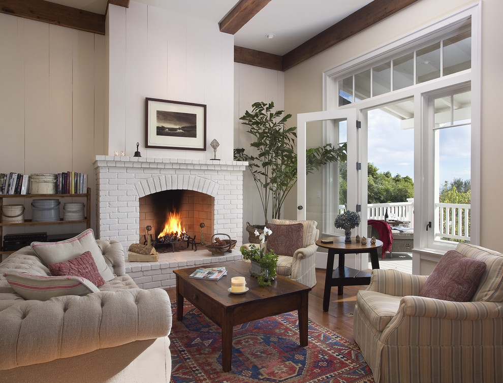 Living room - mid-sized traditional living room idea in Santa Barbara with a standard fireplace and a brick fireplace