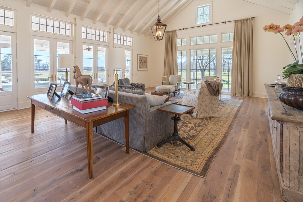 Inspiration for a country medium tone wood floor living room remodel in Austin