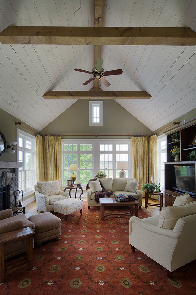 Inspiration for a large country open concept living room remodel in Detroit with green walls, a standard fireplace and a stone fireplace